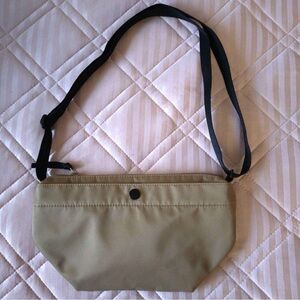 Tan Crossbody Bag with Black Strap